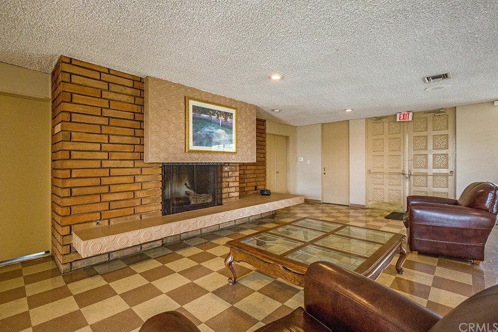 1630 Barranca Avenue, Unit 113 Glendora, CA 91740 - Photo 23 of 33 CLUB HOUSE WITH FIREPLACE