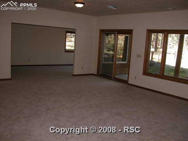 1120 Timber Valley Road Colorado Springs, CO 80919 - Photo 11 of 16 Family room - second angle