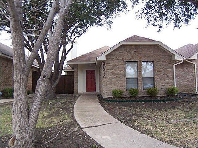 2027 Falcon Ridge Drive, Unit A Carrollton, TX 75010 - Photo 1 of 1 Adorable remodeled garden home