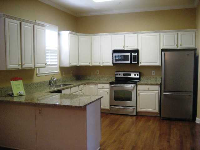 1742 Gosnold Bluff Road Collierville, TN 38017 - Photo 2 of 8 The kitchen has new granite countertops, new stainless appliances including a built-in microwave, bu