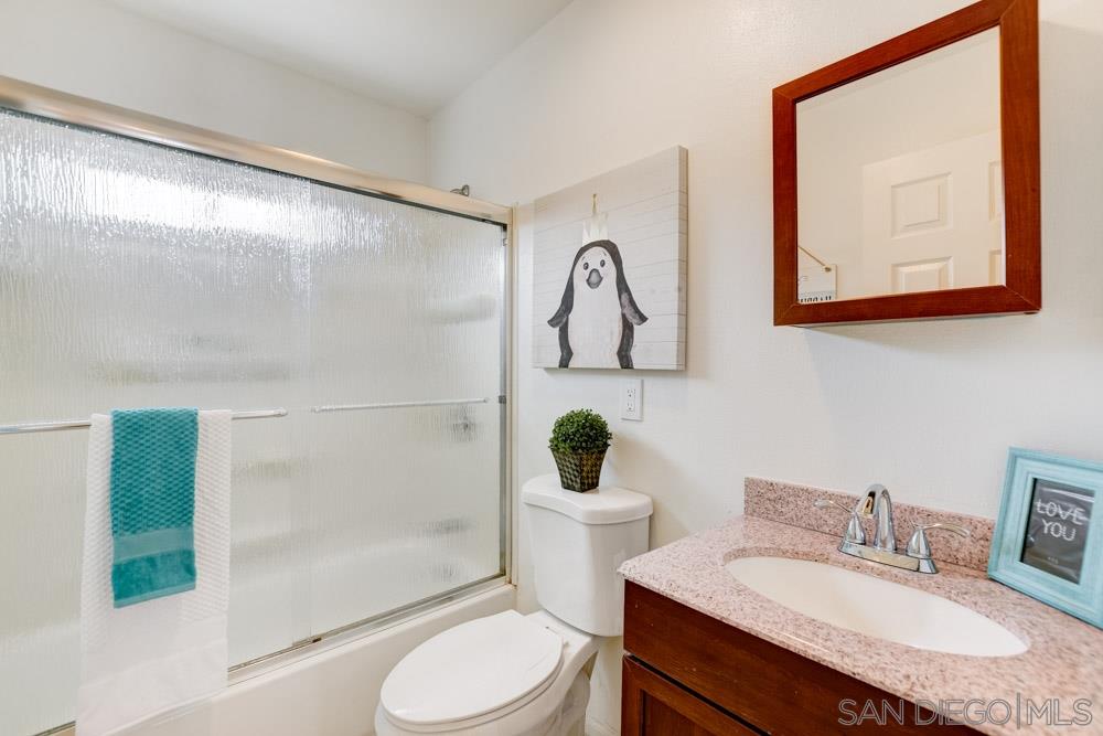 14215 Powers Road Poway, CA 92064 - Photo 18 of 25 Secondary full bathroom with tub. New vanity and toilet.