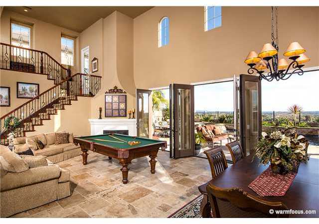 7603 Circulo Sequoia Carlsbad, CA 92009 - Photo 3 of 25 Spacious entry with living & dining room and 3 sets of French doors opening to outside..
