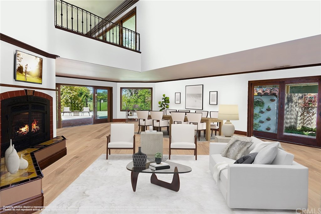 1773 Bahama Place Costa Mesa, CA 92626 - Photo 19 of 20 Open living and dining room has views of the pond and golf course (virtually staged).