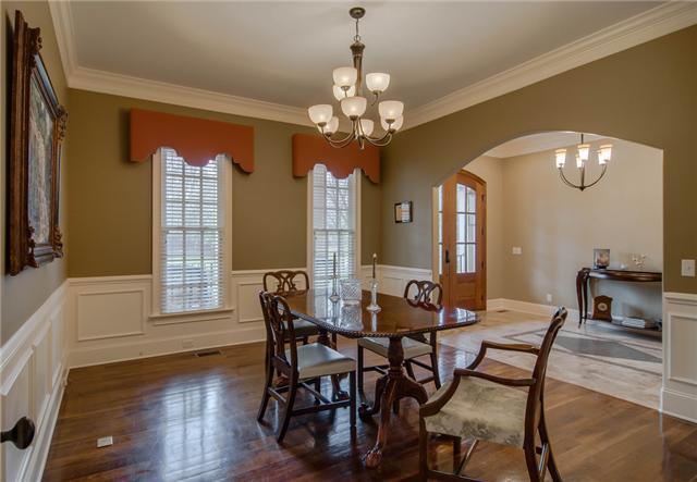 132 Cheek Road Nashville, TN 37205 - Photo 6 of 30 Elegant Formal Dining Room with hand distressed walnut floors. The walnut floors are throughout the home.
