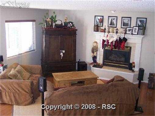 5235 Silo Ridge Colorado Springs, CO 80917 - Photo 4 of 9 Walkout Family Room