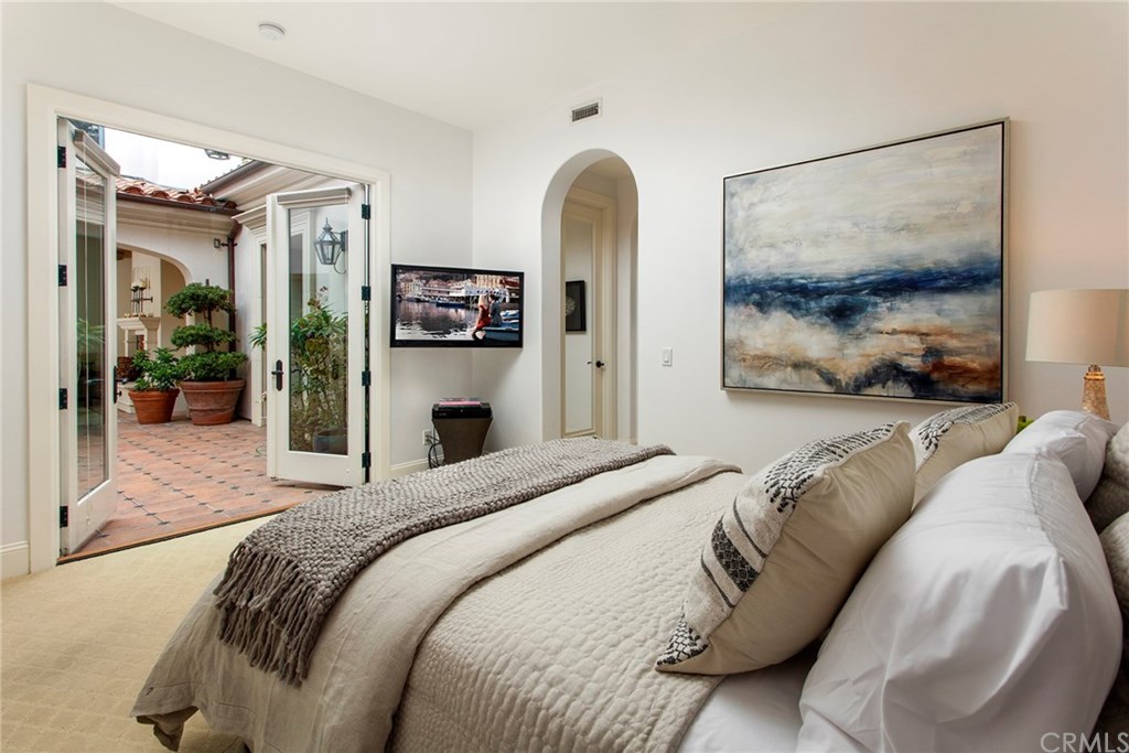 2 Scenic Bluff Newport Coast, CA 92657 - Photo 13 of 33 Ground floor guest suit opens into the front courtyard