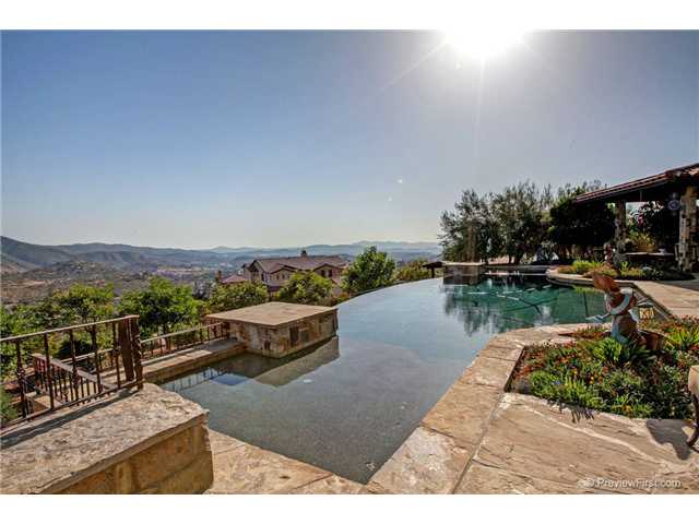5111 Espinoza Road El Cajon, CA 92021 - Photo 20 of 25 BEUTIFULL ZERO EDGE POOL WITH SOLAR HEATING.