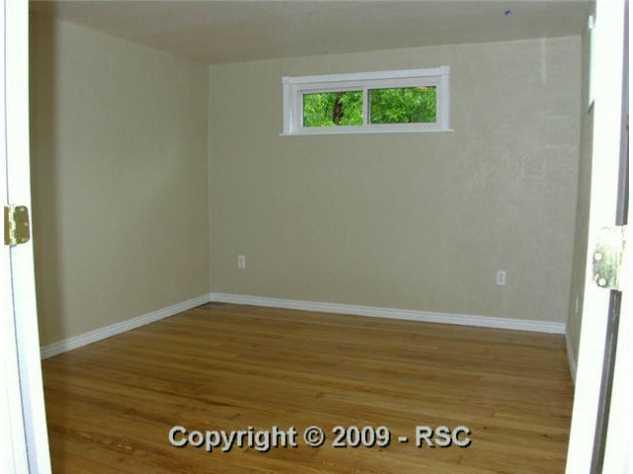 1935 Mid Road Colorado Springs, CO 80906 - Photo 13 of 16 Bedroom
