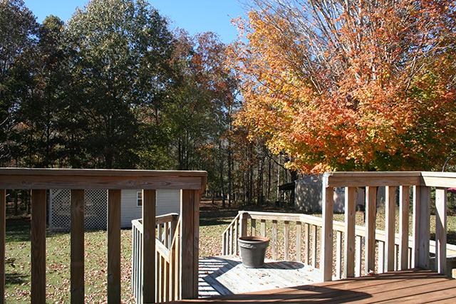 96 Smith Mill Road Fayetteville, TN 37334 - Photo 21 of 30 Step out the backdoor onto the step down double deck for cookouts and enjoying the privacy of this backyard with park like setting.
