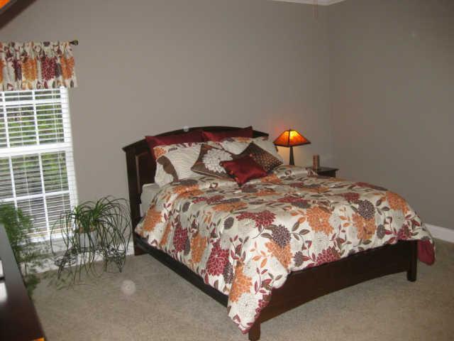 6918 Ridley Earp Road Christiana, TN 37037 - Photo 3 of 8 BEDROOM TWO WITH PRIVATE BATH WITH GRANITE AND TILE.