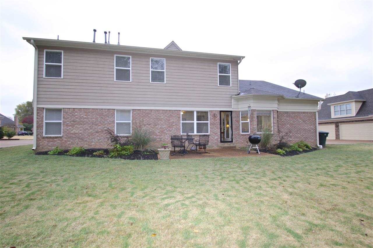 4371 High Plains Road Bartlett, TN 38135 - Photo 24 of 25 The backyard backs up to the greenbelt and features a nice patio, which is great for cookouts and parties.