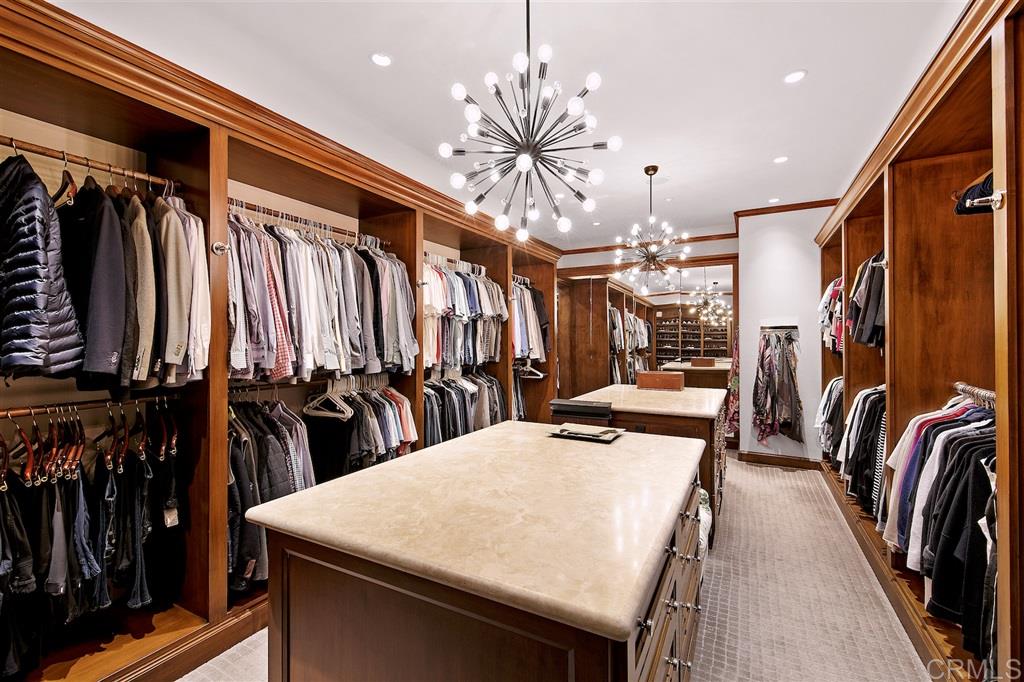 6221 Mimulus Rancho Santa Fe, CA 92067 - Photo 22 of 25 Beautiful, boutique custom closet with accessory cabinets, shoe display, handbag area etc.