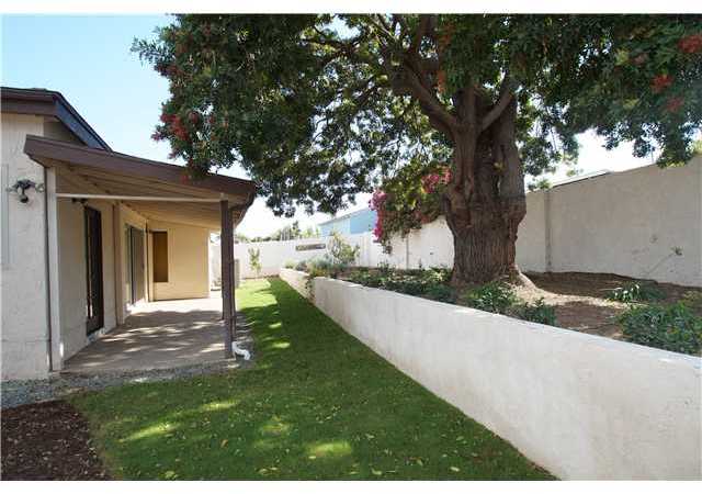 2452 Glebe Road Lemon Grove, CA 91945 - Photo 24 of 25 Low maintenance yard with CA native drought resistant pants, trees and grass.
