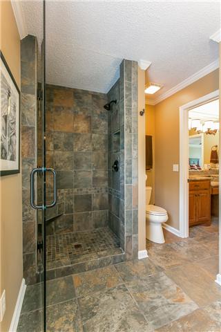 1116 Abbey Road Columbia, TN 38401 - Photo 19 of 30 New walk-in tile shower. The heated tile floor is throughout the whole master bath.