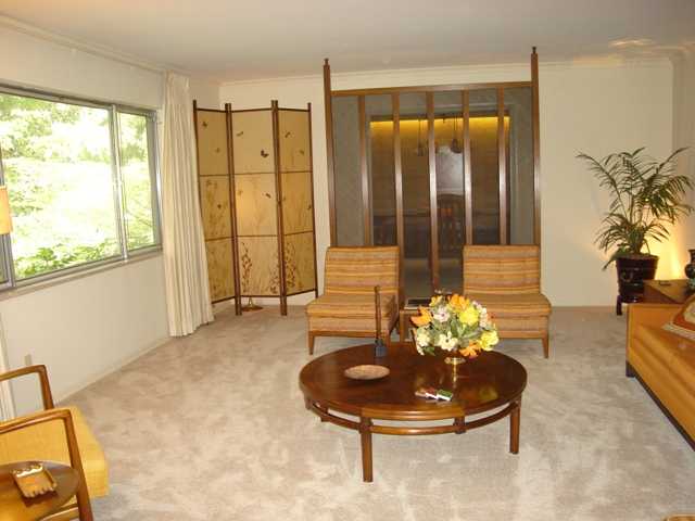 4530 Shady Grove Road Memphis, TN 38117 - Photo 4 of 22 Elegant Formal Living Room with Carpet, Crown Molding, and Large Picture Window with Marble Window Sills