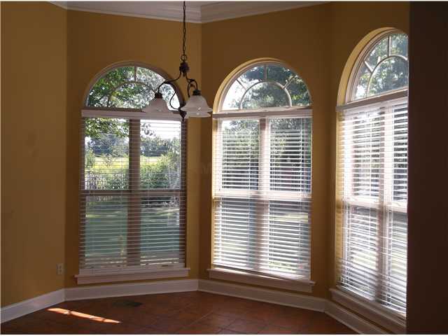 14 Eagle Trace Road Covington, TN 38019 - Photo 17 of 20 Breakfast Area has beautiful windows and tile floor.