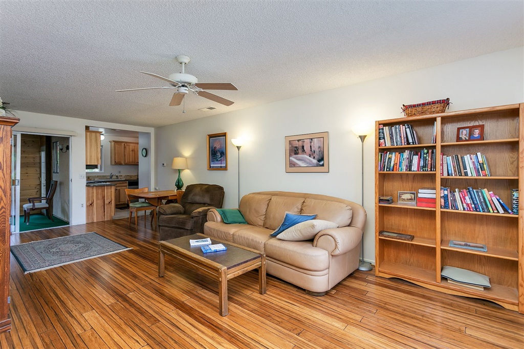 1387 Peacock Boulevard Oceanside, CA 92056 - Photo 3 of 15 Large combined living room & dining area show beautiful bamboo flooring.