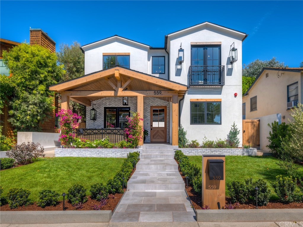 559 31st Street Manhattan Beach, CA 90266 - Photo 1 of 49 Stunning new 2019 construction. Solara natural gas porch lamps, LaCantina door systems, surround sound on porch, sandblasted marble entry tiling, dutch door, security cameras.