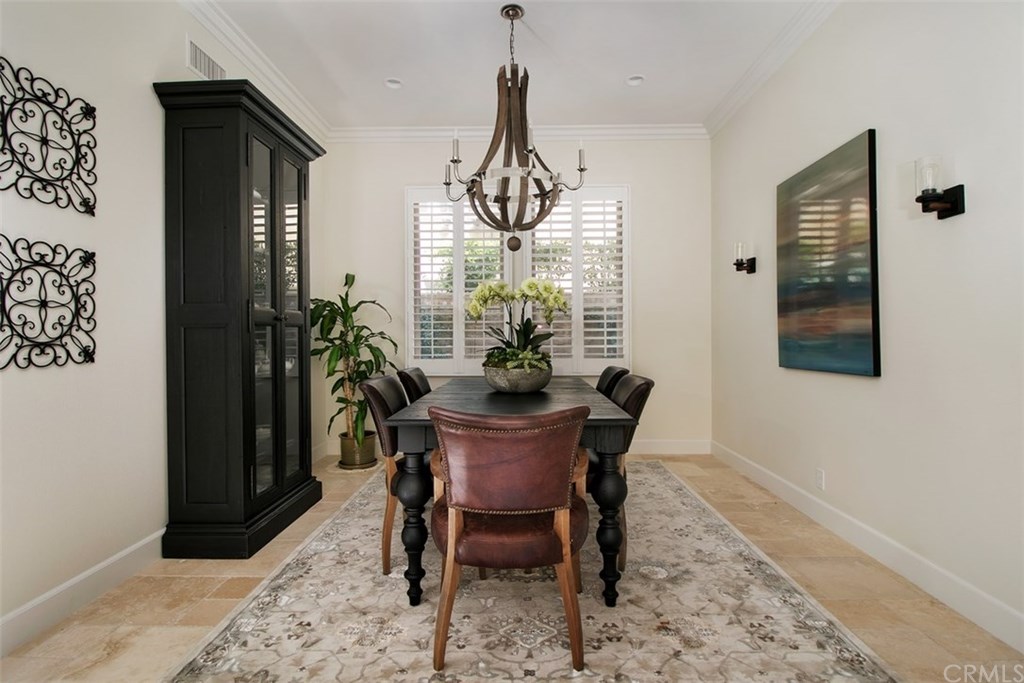 17 Rawhide Irvine, CA 92602 - Photo 3 of 56 Large formal dining area with gorgeous Restoration Hardware chandelier.