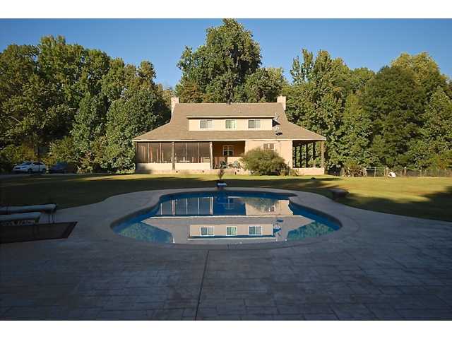 943 Fite Road Millington, TN 38053 - Photo 1 of 25 TWO Newer Houses on 20+ Totally Private Acres! Perfect for Extended Family, Corporate or Weekend Retreat with 3 Bedroom, 2? Bath Main House with Granite/Stainless Kitchen w/20 Cabinets! 1000 SF Even Newer Guest House!