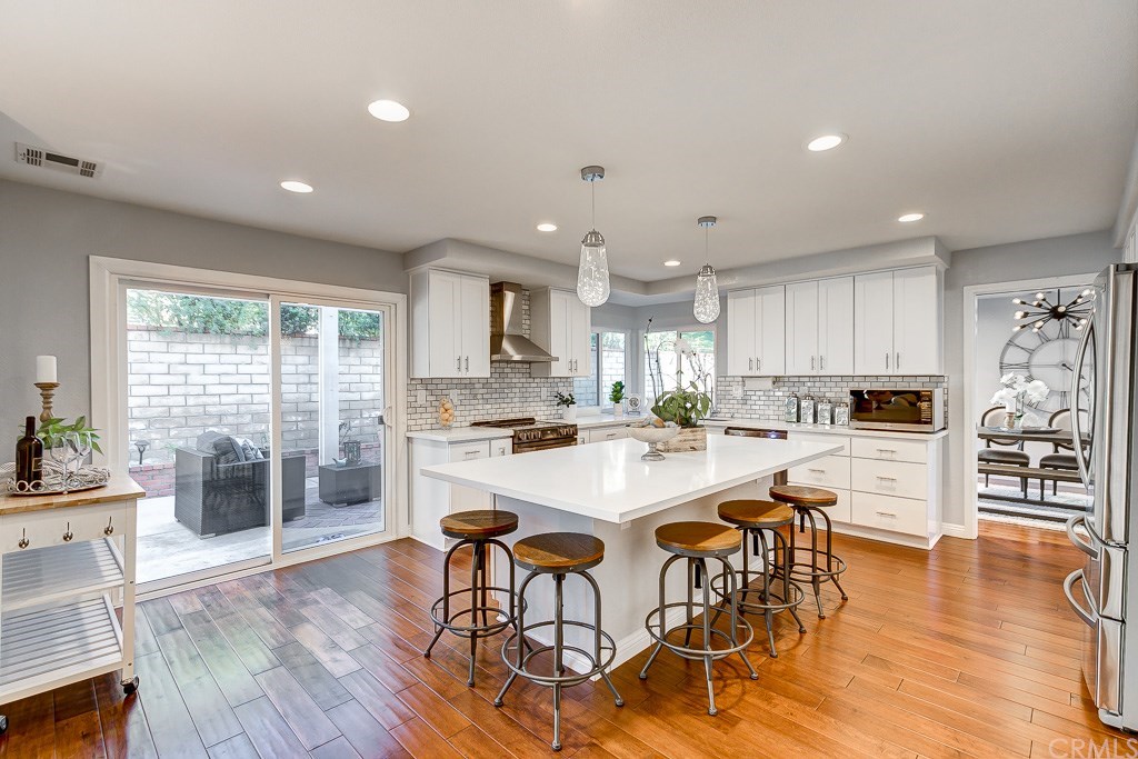 1000 Shadow Canyon Road Brea, CA 92821 - Photo 4 of 32 Gorgeous pendant lighting and large sliders to back yard make entertaining easy.