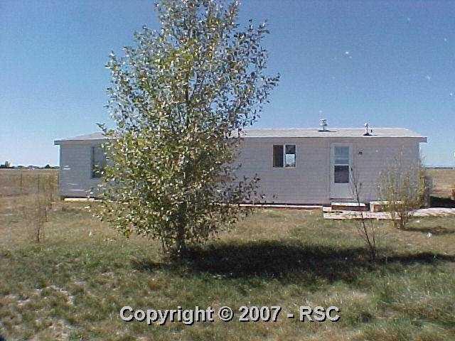 24785 Handle Road Ellicott, CO 80808 - Photo 1 of 3 Front