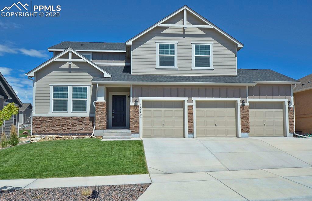 Front of two story w/full basement