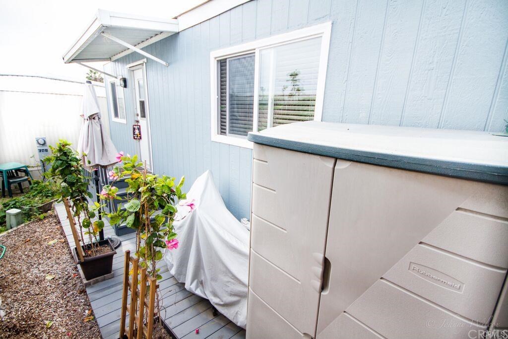 80 Huntington Street, Unit 208 Huntington Beach, CA 92648 - Photo 2 of 18 Home features 3 sheds (rare in the community) and a side access back door.