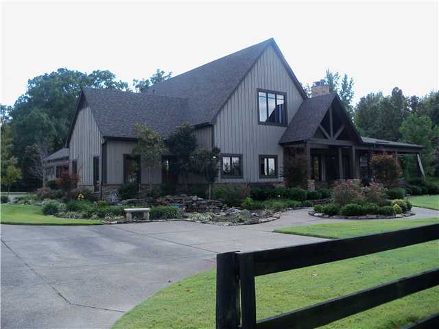 745 Anderson Road Moscow, TN 38057 - Photo 7 of 25 Lots of parking and turnaround room and gorgeous professional landscaping. Professional irrigation system takes care of watering with 16 different zones