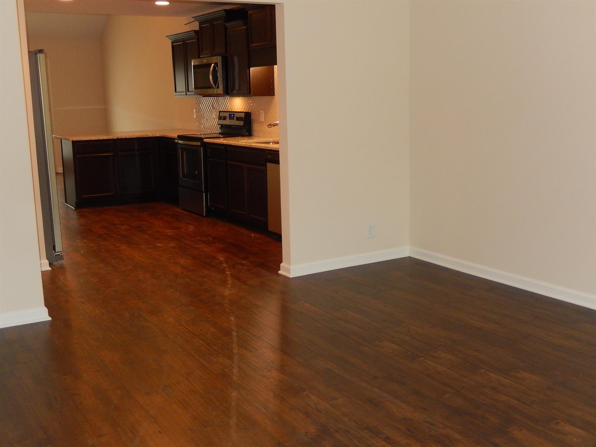 Large Great Room and Laminate Flooring.