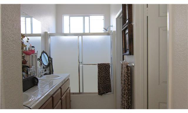 1005 Cottage Way Encinitas, CA 92024 - Photo 9 of 12 Master Bathroom. Tub/Shower and Walk-In Closet. 2 sinks
