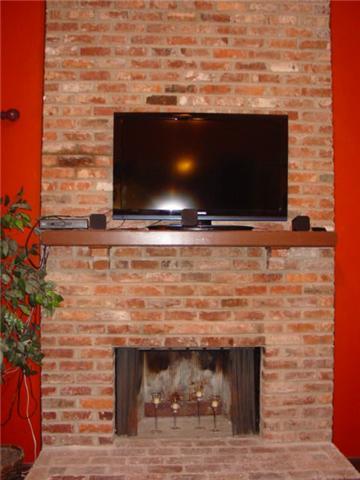 3300 Country Way Road Antioch, TN 37013 - Photo 21 of 30 FLOOR TO CEILING BRICK FIREPLACE IN THE DEN... ADDS AMBIENCE TO THOSE COOL EVENINGS