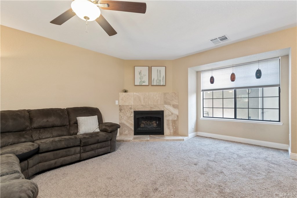 628 4th Street Paso Robles, CA 93446 - Photo 6 of 22 Perfect gathering spot in the good sized living room by the fireplace and window