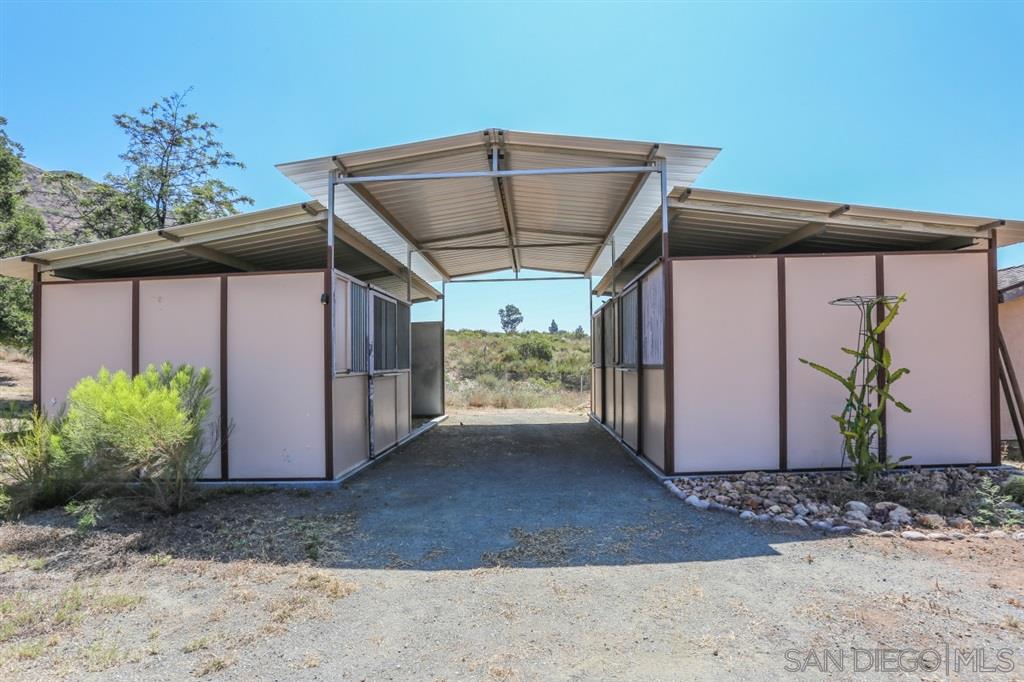 18921 Highway 94 Dulzura, CA 91917 - Photo 21 of 25 Large 3 stall barn with a storage area that can be converted to a 4th stall
