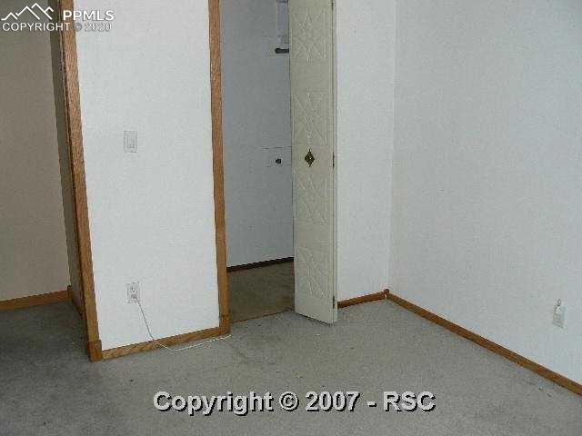1716 Wooten Road Colorado Springs, CO 80915 - Photo 7 of 16 Bed 3