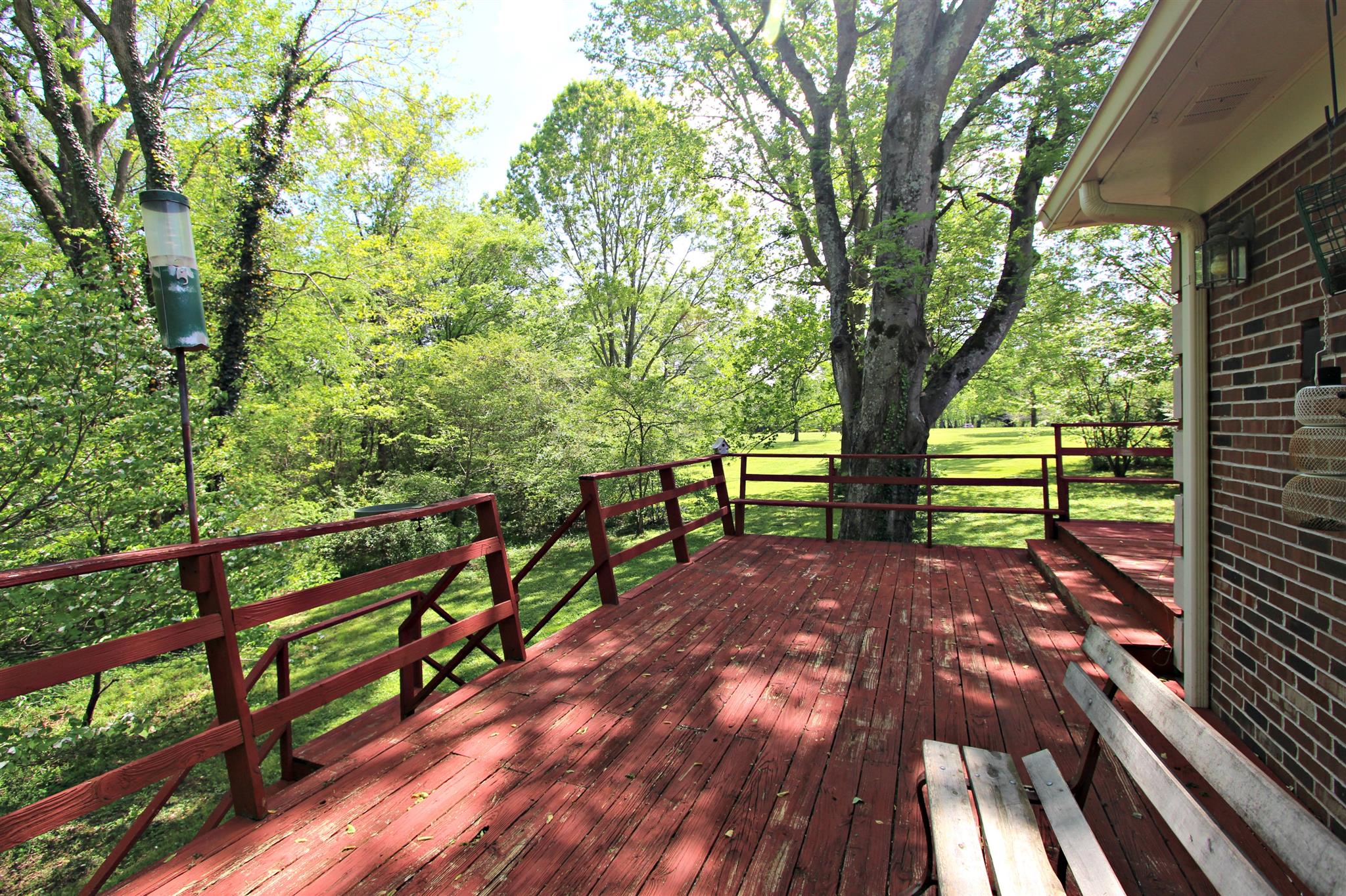 300 Kippsford Pond Road Columbia, TN 38401 - Photo 6 of 36 Deck wraps to back side of house.