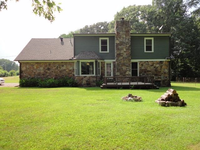 2575 Warren Road Oakland, TN 38060 - Photo 19 of 25 The dimensional shingle roof is about 7 years old and the deck has been restored too.