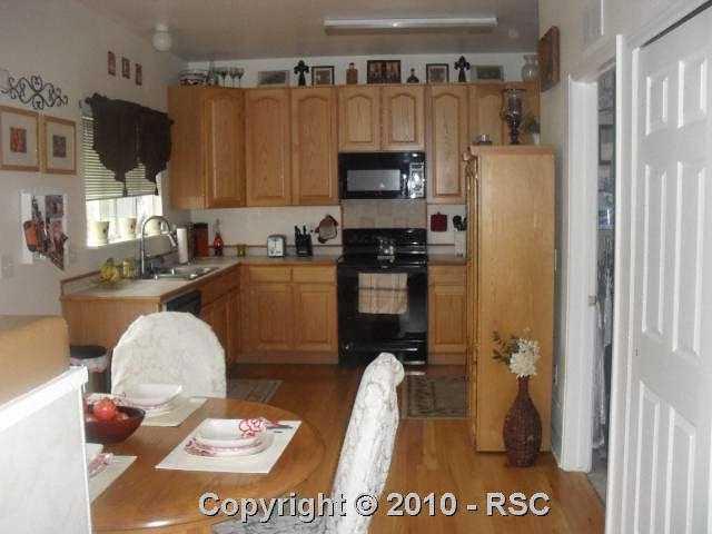 7536 Coffee Road Peyton, CO 80831 - Photo 2 of 6 Kitchen