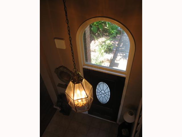 8801 Dexter Road Memphis, TN 38016 - Photo 6 of 12 View from balcony to foyer and through front entry. This house is IMMACULATE.