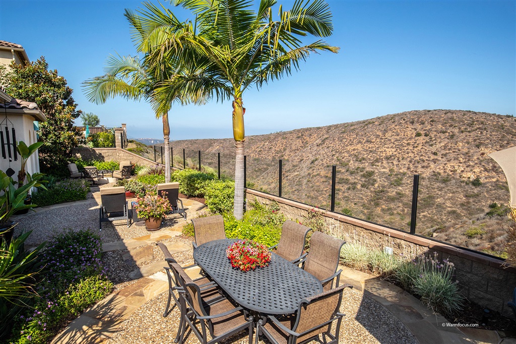 7091 Sitio Caliente Carlsbad, CA 92009 - Photo 2 of 23 Very Private, Peaceful yard with magnificent views over nature preserve!