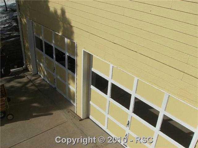 7025 Tobin Road Colorado Springs, CO 80908 - Photo 10 of 15 Over-sized 2 car garage under house