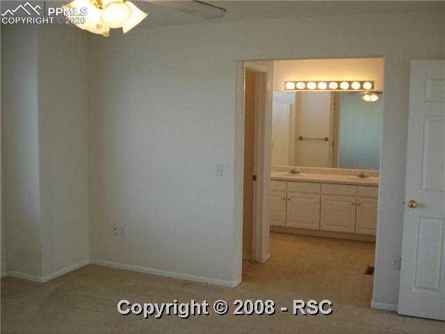 7796 Coffee Road Peyton, CO 80831 - Photo 8 of 14 Upper level bedroom #2