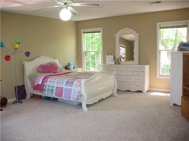 769 West Powell Road Collierville, TN 38017 - Photo 9 of 12 This HUGE room has a walk-in closet, perfect for a teen suite or a bonus/media room. Ceiling fans in each bedroom, lots of natural light -plenty of space for playroom or bedroom -or both!