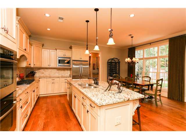 4401 Normandy Road Memphis, TN 38117 - Photo 7 of 21 A modern, spacious open kitchen, large granite island, gas cooktop, built-in trash, beautiful side yard views, huge walk-in 8 foot pantry and butlers pantry will all the pleasure of the activity going on in the great room. Enjoy!