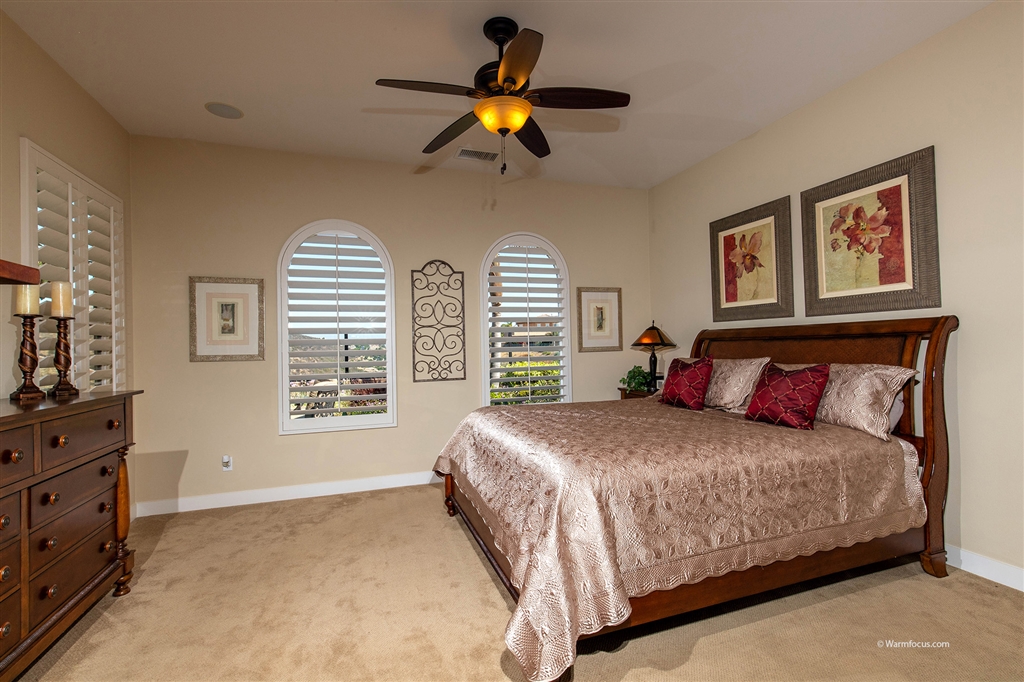 7091 Sitio Caliente Carlsbad, CA 92009 - Photo 10 of 23 Downstairs Master Suite provides one story living and we all know how tough it is to find a newer 1 story with a great view!