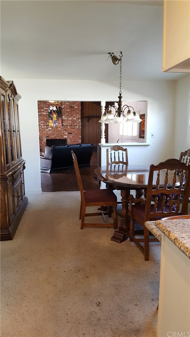 15744 Marlinton Drive Whittier, CA 90604 - Photo 51 of 52 Long shot of kitchen. dine area and a beautiful large family room.