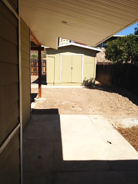9722 Abbeywood Road Santee, CA 92071 - Photo 20 of 21 OUTSIDE STORAGE AND COVERED PATIO ON NORTH SIDE.
