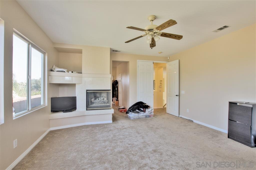 17250 Scottsdale Road Riverside, CA 92504 - Photo 18 of 25 Master Bedroom features fireplace #2 and walk in closet