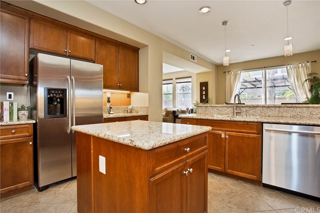 21 Corte Javier San Clemente, CA 92673 - Photo 4 of 30 Family and friends can keep you company while you prepare meals at the breakfast counter/bar.