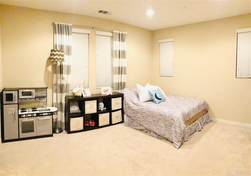 17 Alzada Street Rancho Mission Viejo, CA 92694 - Photo 12 of 20 2nd bedroom is a mini master size complete with walkin closet and ensuite bath/shower.